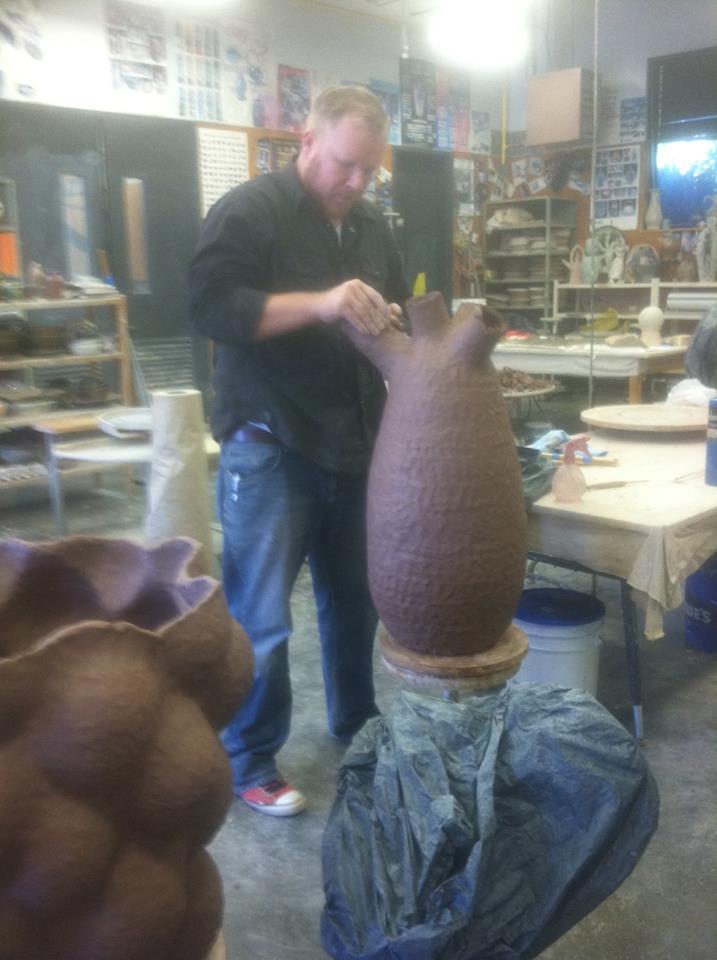 David Hicks molding a pot